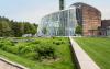 Large green roof with lawn, shrubs and walkways